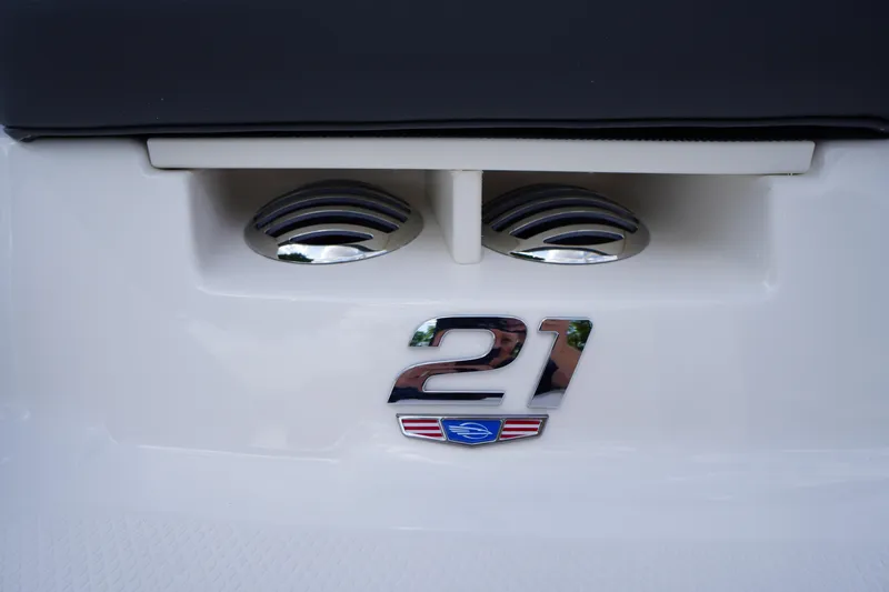 Slide: The Image of 2026 Chaparral 21 SSi OB boat emblem with chrome detailing. - 34
