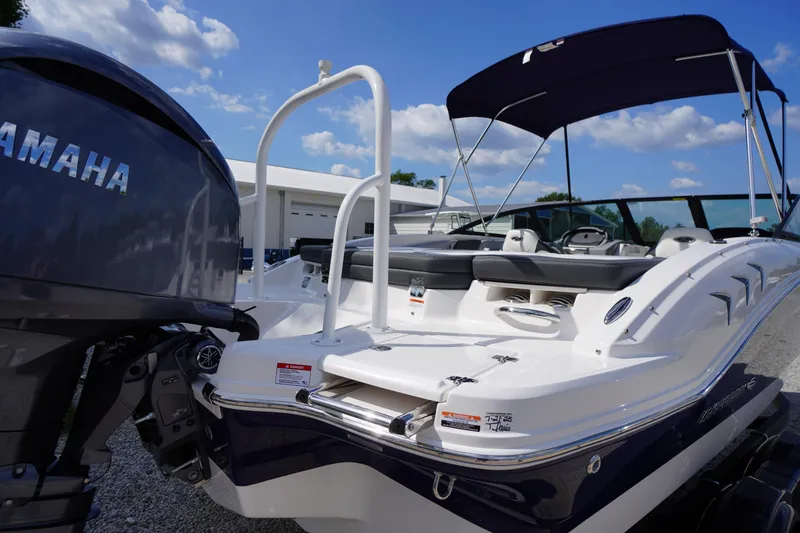 Slide: The Image of 2026 Chaparral 21 SSi OB boat with Yamaha engine, featuring sleek design and spacious seating. - 37