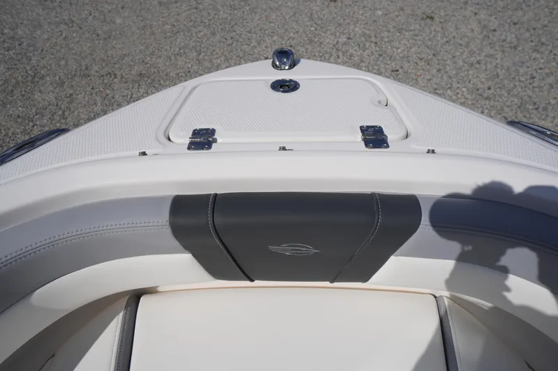 Slide: The Image of 2026 Chaparral 21 SSi OB boat bow seating with storage compartment. - 4