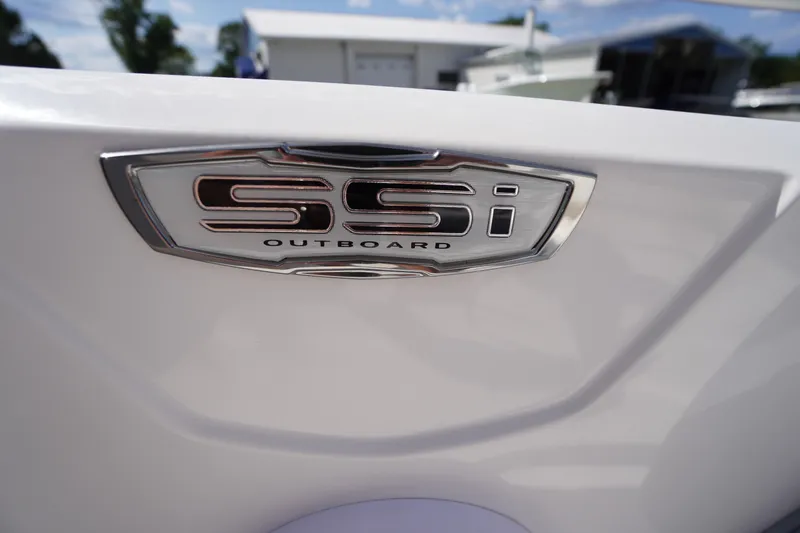 Slide: The Image of 2026 Chaparral 21 SSi OB boat emblem, showcasing sleek design and branding. - 8