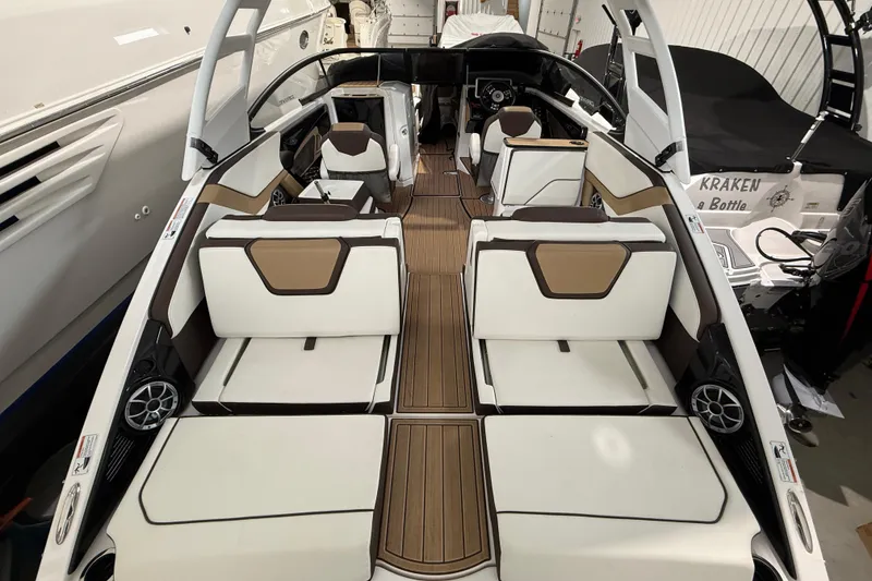 Slide: The Image of 2023 Yamaha Boats 252SD interior with sleek seating and modern design. - 12