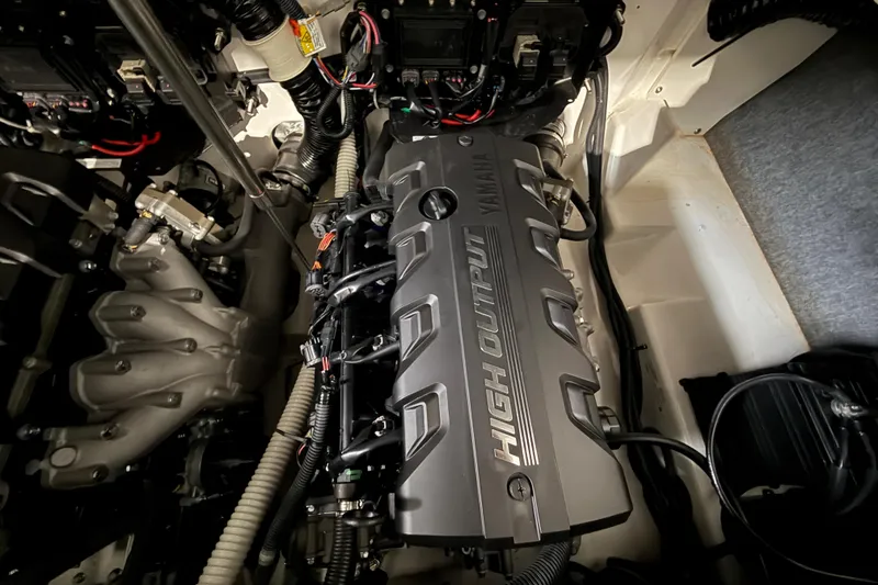 Slide: The Image of 2023 Yamaha Boats 252SD engine compartment showcasing high output engine components. - 16