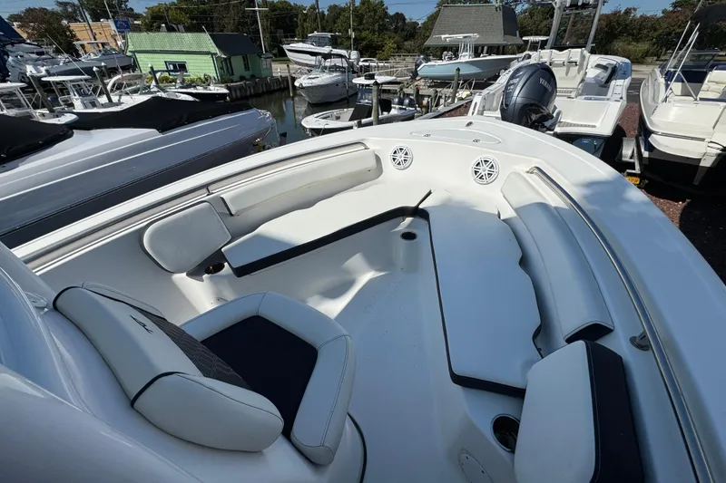 Slide: The Image of 2021 Tidewater 210 CC Adventure boat with spacious seating and modern design. - 11