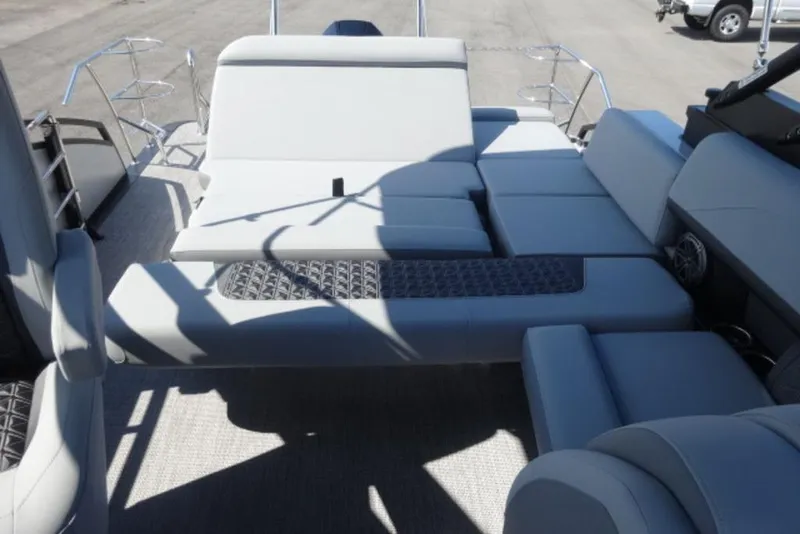 Slide: The Image of 2026 Harris Solstice 250 boat interior with luxurious seating and modern design. - 10