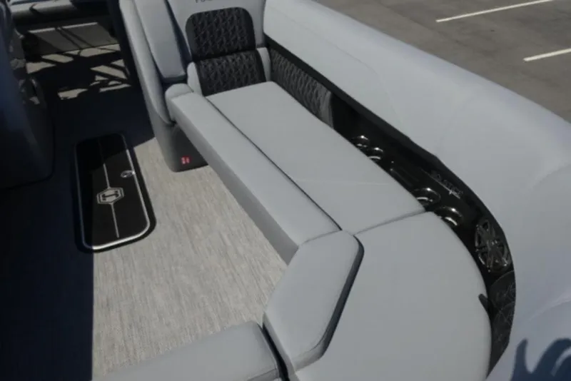 Slide: The Image of 2026 Harris Solstice 250 boat interior with sleek gray seating and modern design. - 4