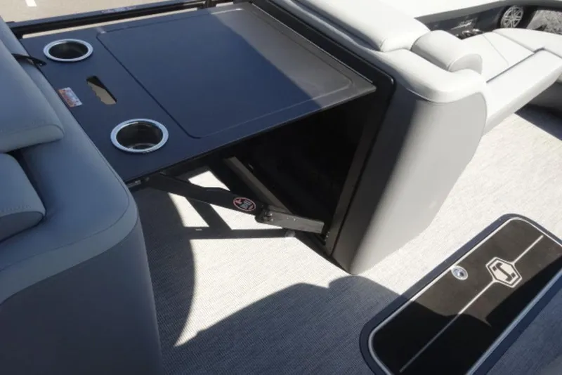 Slide: The Image of 2026 Harris Solstice 250 boat interior with adjustable seating and cup holders. - 8