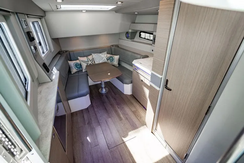 Slide: The Image of 2019 Formula 430 All Sport Crossover interior with modern seating and dining area. - 30