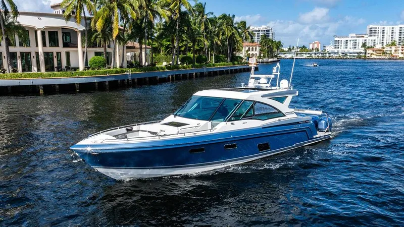 Slide: The Image of 2019 Formula 430 All Sport Crossover yacht cruising on a sunny waterfront. - 4