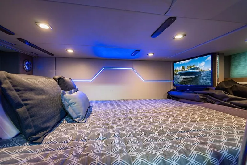 Slide: The Image of Luxurious interior of 2019 Formula 430 All Sport Crossover with cozy bed and ambient lighting. - 40