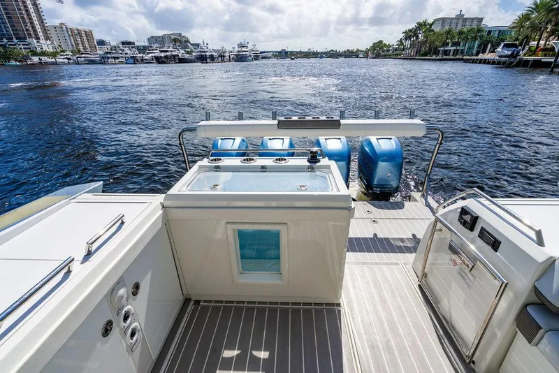 Slide: The Image of 2019 Formula 430 All Sport Crossover boat with outboard motors on a scenic waterway. - 46