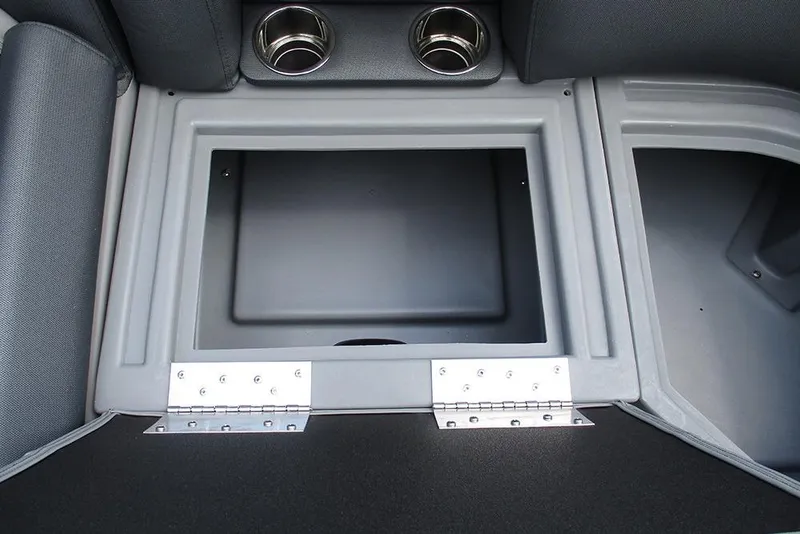 Slide: The Image of 2026 Bentley Pontoons 223 Bolt storage compartment with cup holders and sleek design. - 13