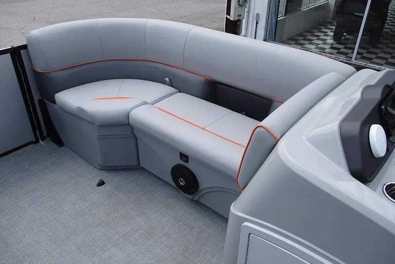 Slide: The Image of 2026 Bentley Pontoons 223 Bolt interior with sleek gray seating and orange accents. - 15