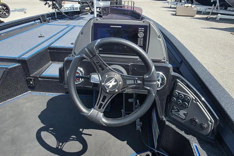 Slide: The Image of Steering console of 2026 Xpress X21 Pro boat with advanced controls and navigation system. - 17