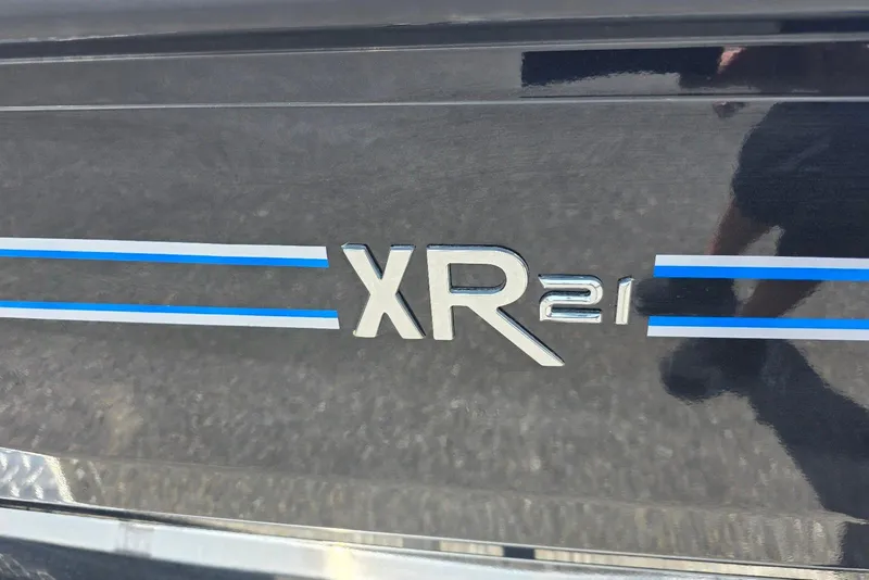 Slide: The Image of Close-up of Xpress X21 Pro 2026 model logo with blue accents. - 3