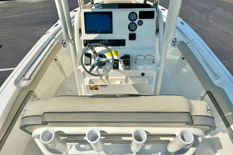 Slide: The Image of 2026 Key West 219 FS boat dashboard with steering wheel and controls. - 28