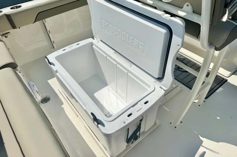 Slide: The Image of Open cooler on 2026 Key West 219 FS boat deck, showcasing spacious storage. - 35