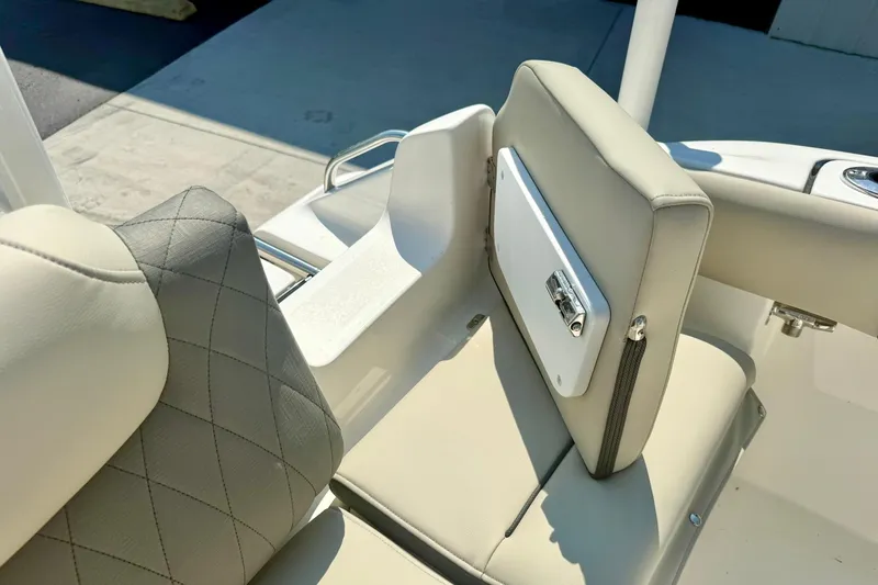 Slide: The Image of 2026 Key West 219 FS boat seating with elegant upholstery and storage compartment. - 40