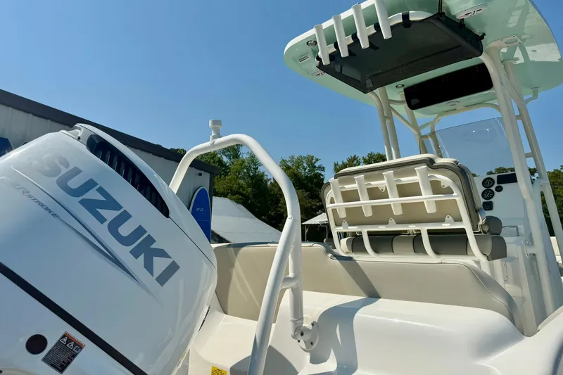 Slide: The Image of 2026 Key West 219 FS boat with Suzuki engine, featuring a sleek design and modern amenities. - 43
