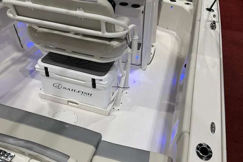 Slide: The Image of 2026 Sailfish 232 CC boat interior with seating and storage. - 8