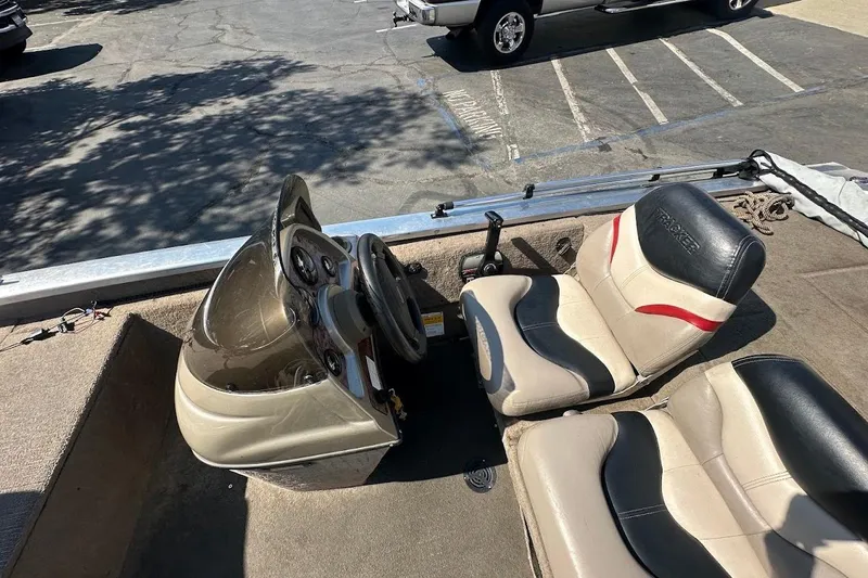 Slide: The Image of 2001 Bass Tracker Pro Team 175 boat interior with steering console and seating. - 16