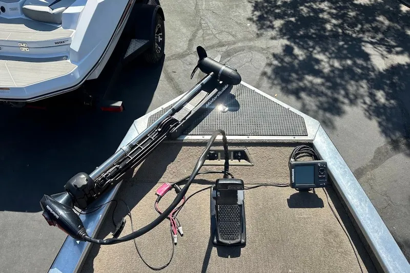 Slide: The Image of 2001 Bass Tracker Pro Team 175 boat with trolling motor and fish finder. - 22