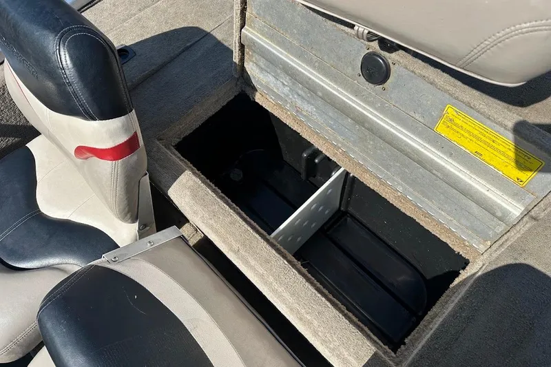 Slide: The Image of 2001 Bass Tracker Pro Team 175 boat interior storage compartment with seats. - 29