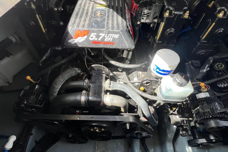 Slide: The Image of Engine compartment of a 2001 Sea Ray 290 Sundancer with 5.7L EFI engine. - 25