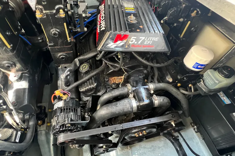 Slide: The Image of Engine of a 2001 Sea Ray 290 Sundancer with 5.7L EFI MerCruiser. - 26