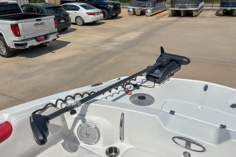 Slide: The Image of 2019 Tahoe 2150 boat with MotorGuide trolling motor in a parking lot. - 15
