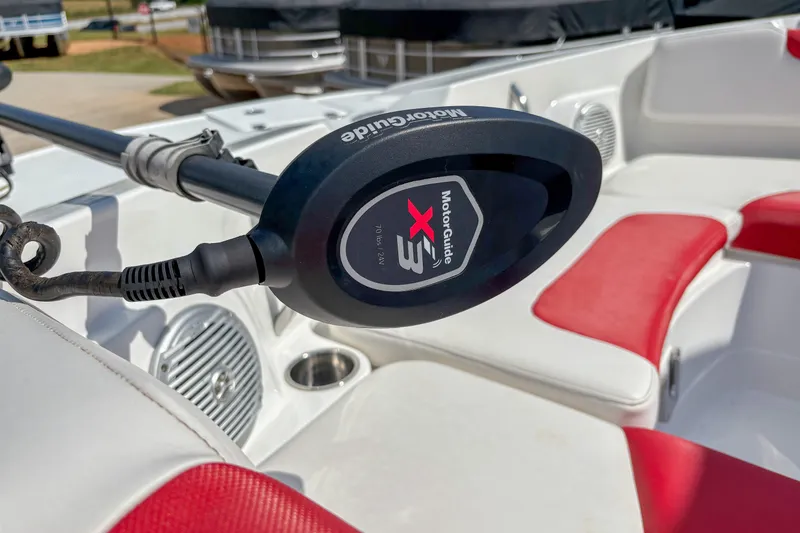 Slide: The Image of MotorGuide X3 trolling motor on 2019 Tahoe 2150 boat with red and white seating. - 6