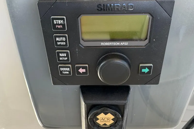 Slide: The Image of Simrad Robertson AP22 control panel on 2000 Tiara Yachts 3500 Express. - 25