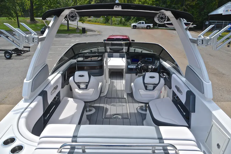 Slide: The Image of 2020 Chaparral 25 Surf boat interior with modern seating and sleek design. - 20