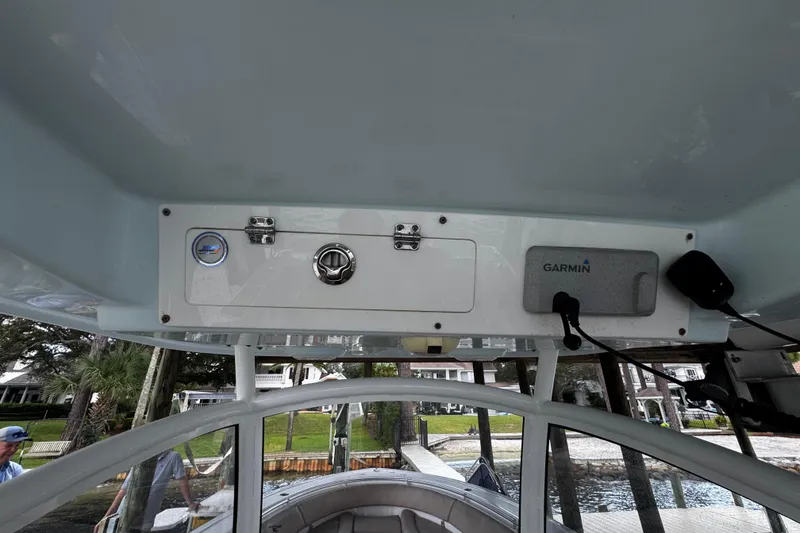 Slide: The Image of 2020 Sportsman Open 312 Center Console boat dashboard with Garmin equipment. - 18