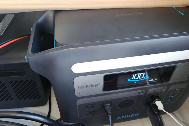 Slide: The Image of Anker power station on Jeanneau Sun Odyssey 37 yacht, 2002 model, displaying 100% charge. - 26