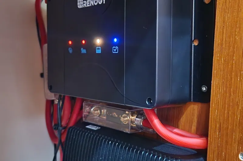 Slide: The Image of Renogy solar charge controller in a 2002 Jeanneau Sun Odyssey 37 yacht. - 27