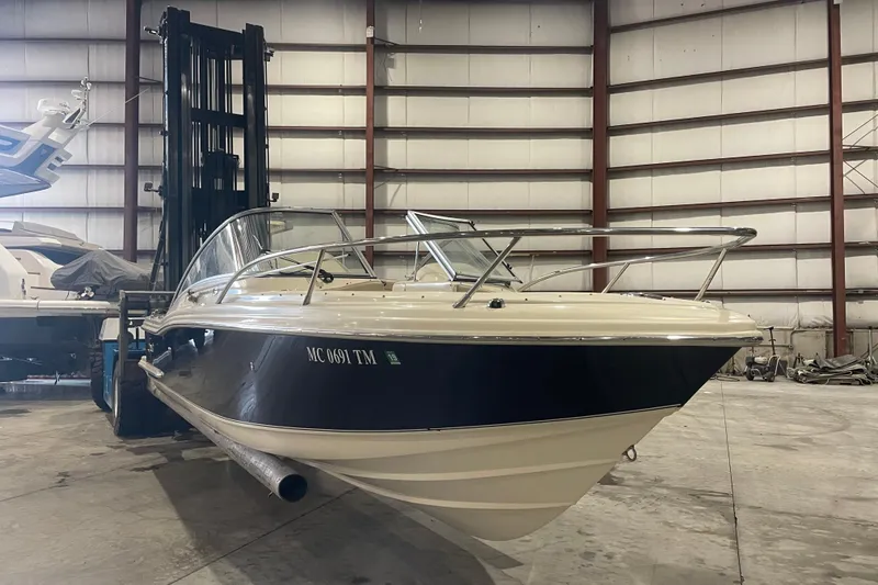 Slide: The Image of 2008 Scout 242 Dorado boat in indoor storage facility. - 1