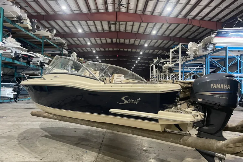 Slide: The Image of 2008 Scout 242 Dorado boat with Yamaha engine in storage facility. - 3