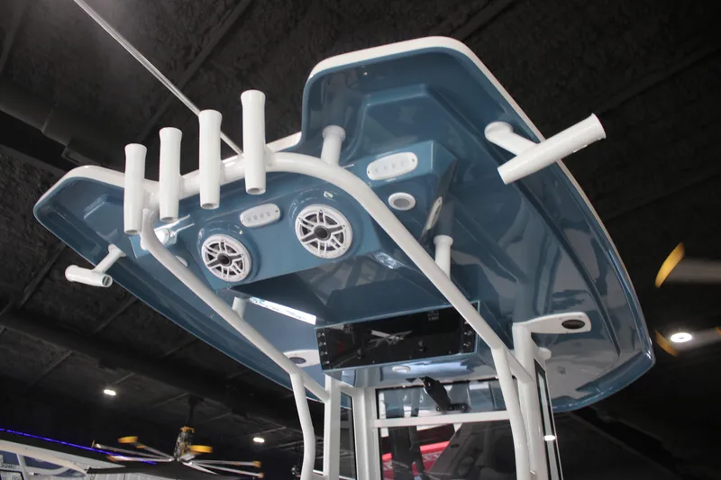 Slide: The Image of 2026 Tidewater 256 LXF boat top view with speakers and rod holders. - 18