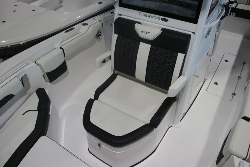 Slide: The Image of 2026 Tidewater 256 LXF boat interior with sleek seating and modern design. - 9