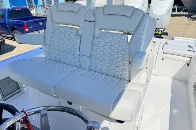 Slide: The Image of 2026 Tidewater 3100 Carolina Bay boat with luxurious dual seating and modern design. - 8