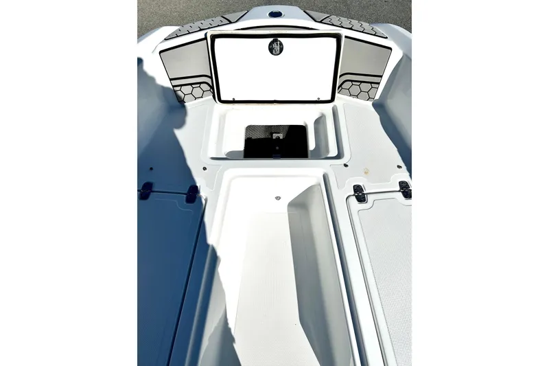 Slide: The Image of 2021 Scarab 195 ID boat interior with storage compartments and sleek design. - 13