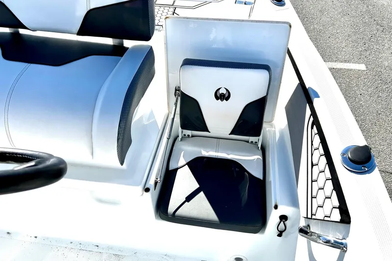 Slide: The Image of 2021 Scarab 195 ID boat interior with stylish seating and modern design elements. - 20