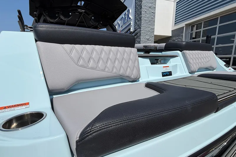 Slide: The Image of 2026 Tigé 24RZX boat interior with diamond-stitched upholstery and TAPS 3T technology. - 10