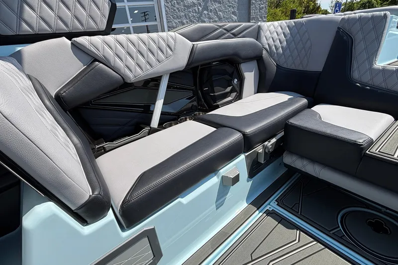 Slide: The Image of 2026 Tigé 24RZX boat interior with luxurious, quilted seating and modern design. - 16