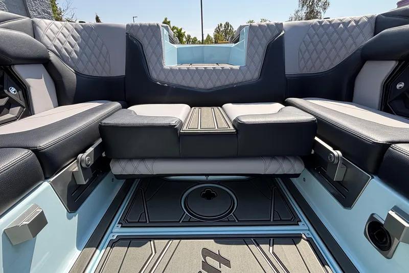 Slide: The Image of Luxurious interior seating of 2026 Tigé 24RZX boat with quilted upholstery. - 17