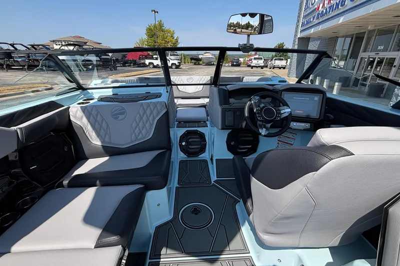 Slide: The Image of 2026 Tigé 24RZX boat interior with modern dashboard and seating. - 20