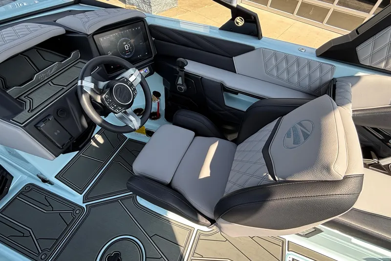 Slide: The Image of 2026 Tigé 24RZX boat interior with modern dashboard and luxurious seating. - 22