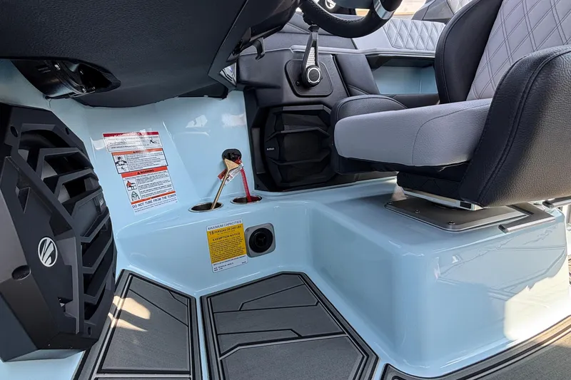 Slide: The Image of 2026 Tigé 24RZX boat interior with modern seating and control panel. - 25