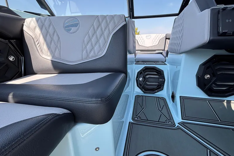 Slide: The Image of 2026 Tigé 24RZX interior with stylish seating and modern speaker system. - 28