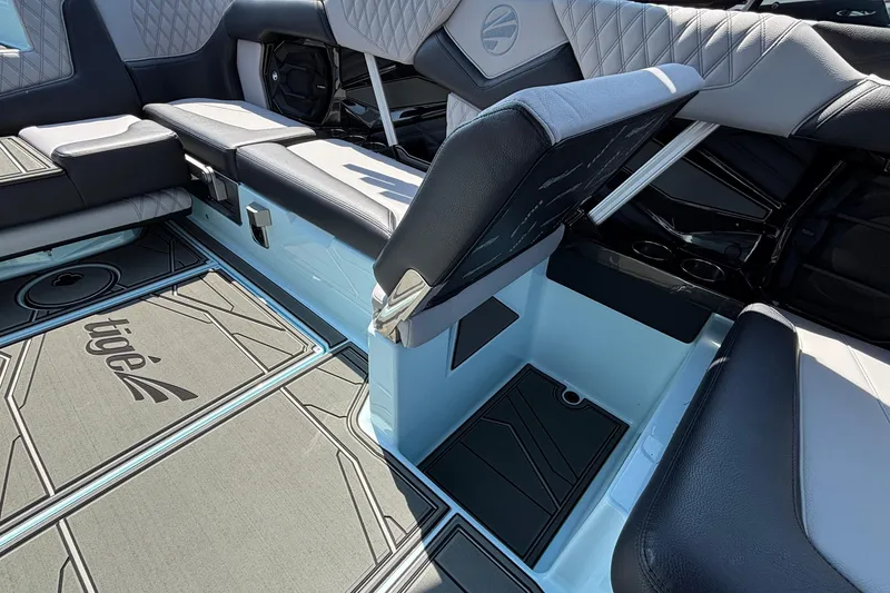 Slide: The Image of Interior of 2026 Tigé 24RZX boat showcasing seating and flooring design. - 29